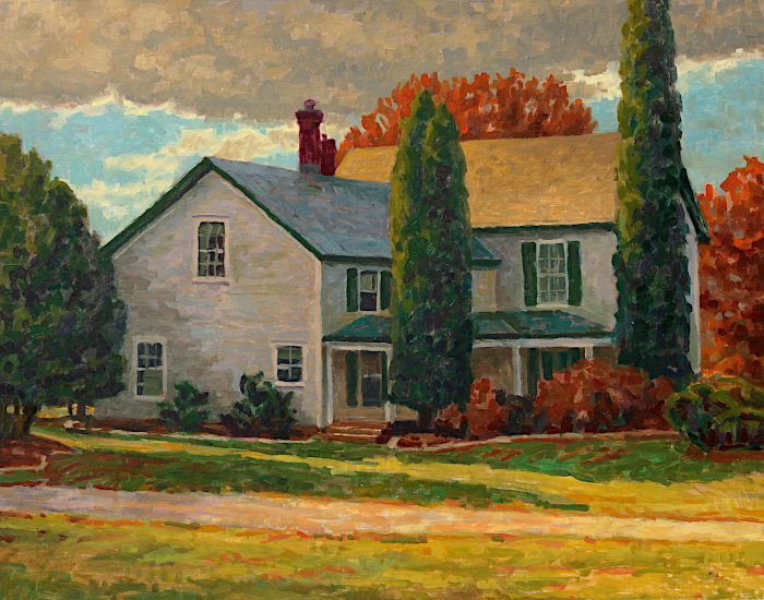 Classic white farmhouse with green shutters